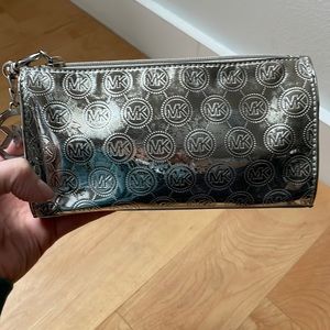 Michael Kors metallic silver cosmetic bag
